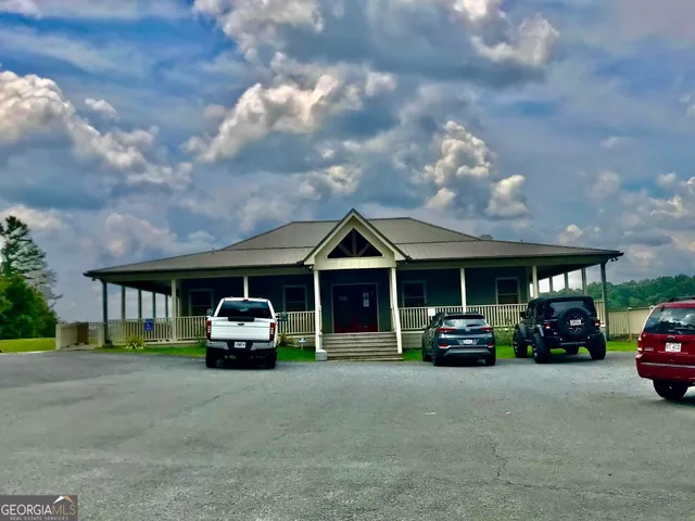a view of a golf course of a building