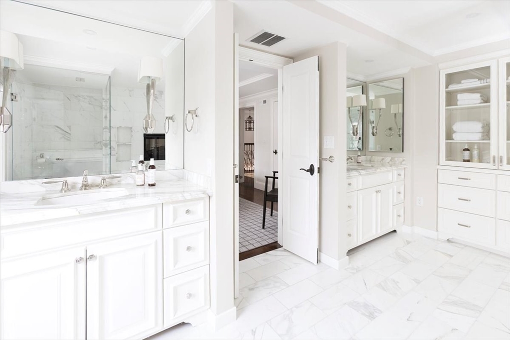 142 Chestnut Street, Unit 89 Boston, MA 02108 - Photo 11 of 16 a bathroom with a sink and a mirror