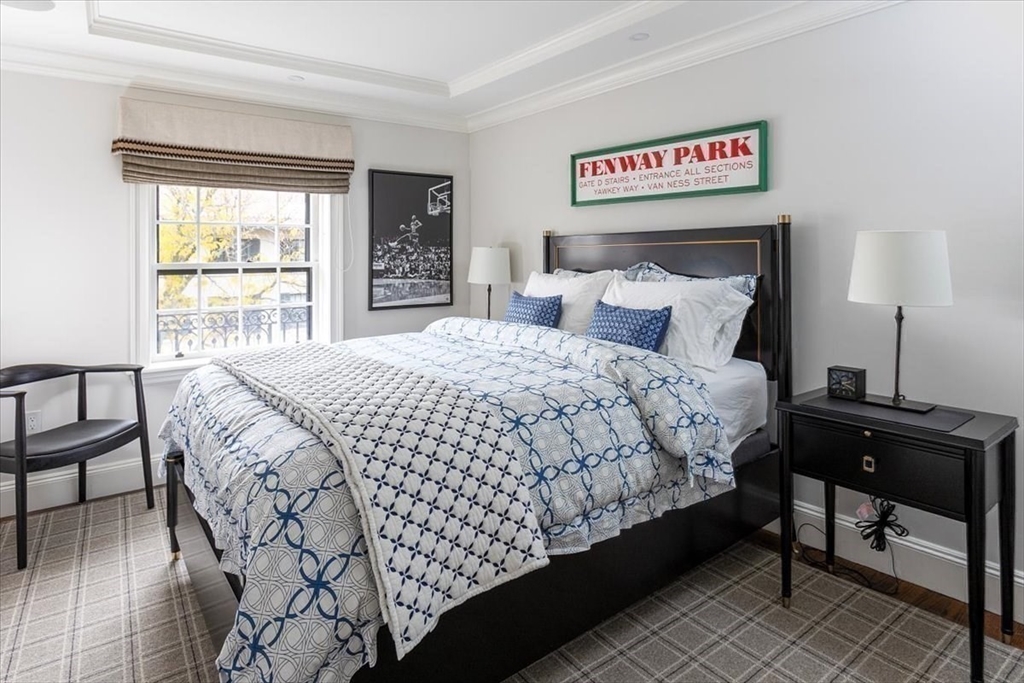 142 Chestnut Street, Unit 89 Boston, MA 02108 - Photo 13 of 16 a bedroom with a bed and a window