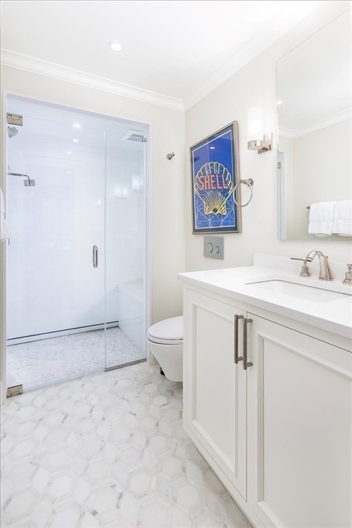 142 Chestnut Street, Unit 89 Boston, MA 02108 - Photo 14 of 16 a bathroom with a sink toilet and shower