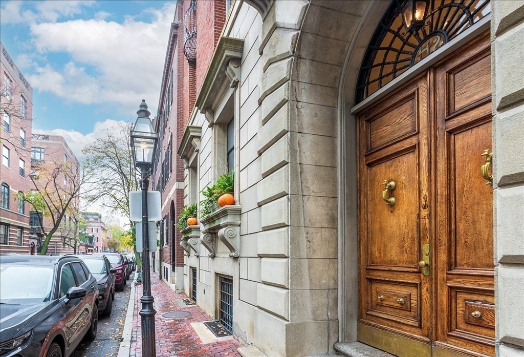 142 Chestnut Street, Unit 89 Boston, MA 02108 - Photo 16 of 16 a view of a brick buildings with entryway doors