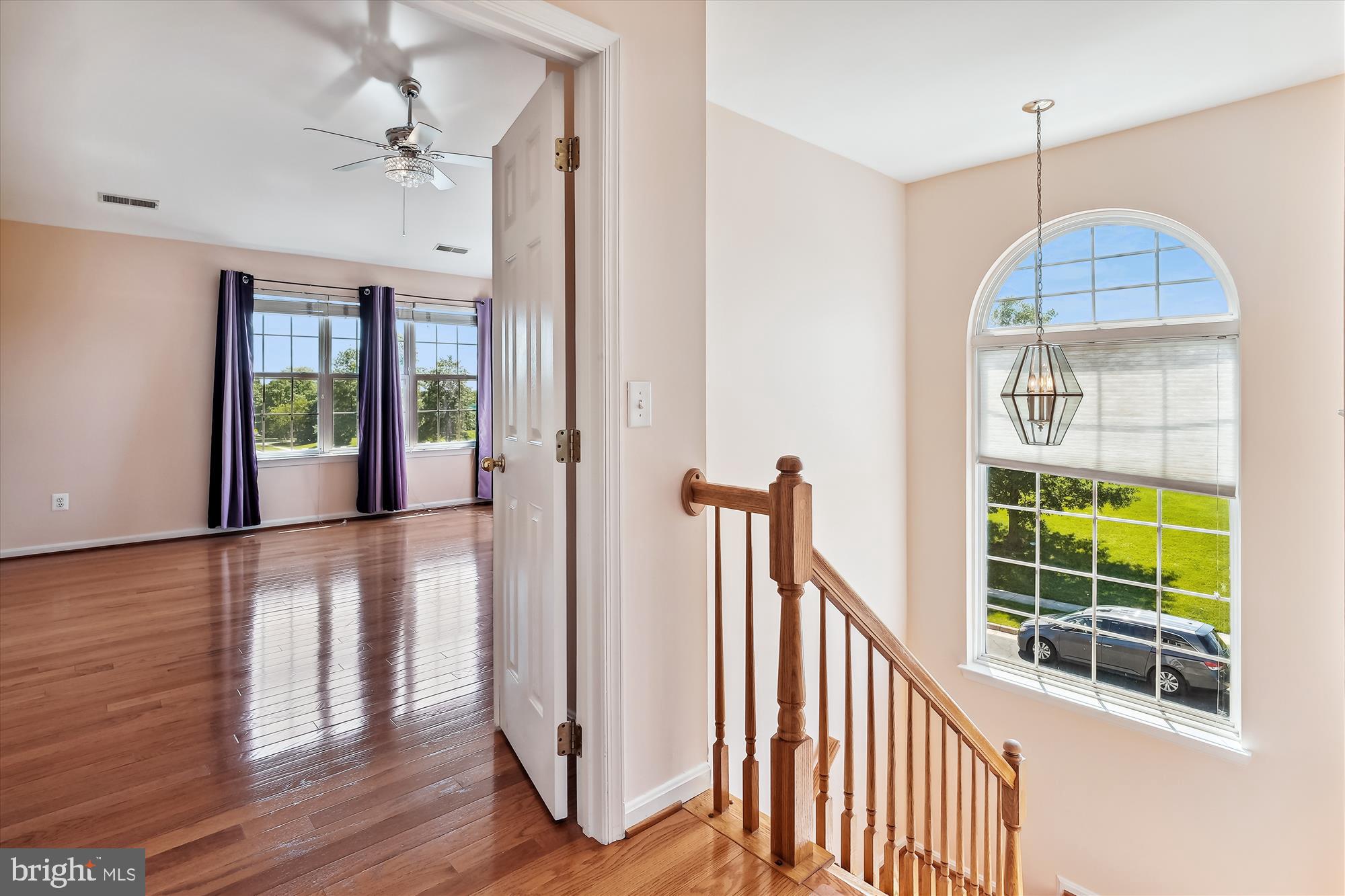 43536 Gabriel Square Chantilly, VA 20152 - Photo 11 of 53 wooden floor in an empty room with a window