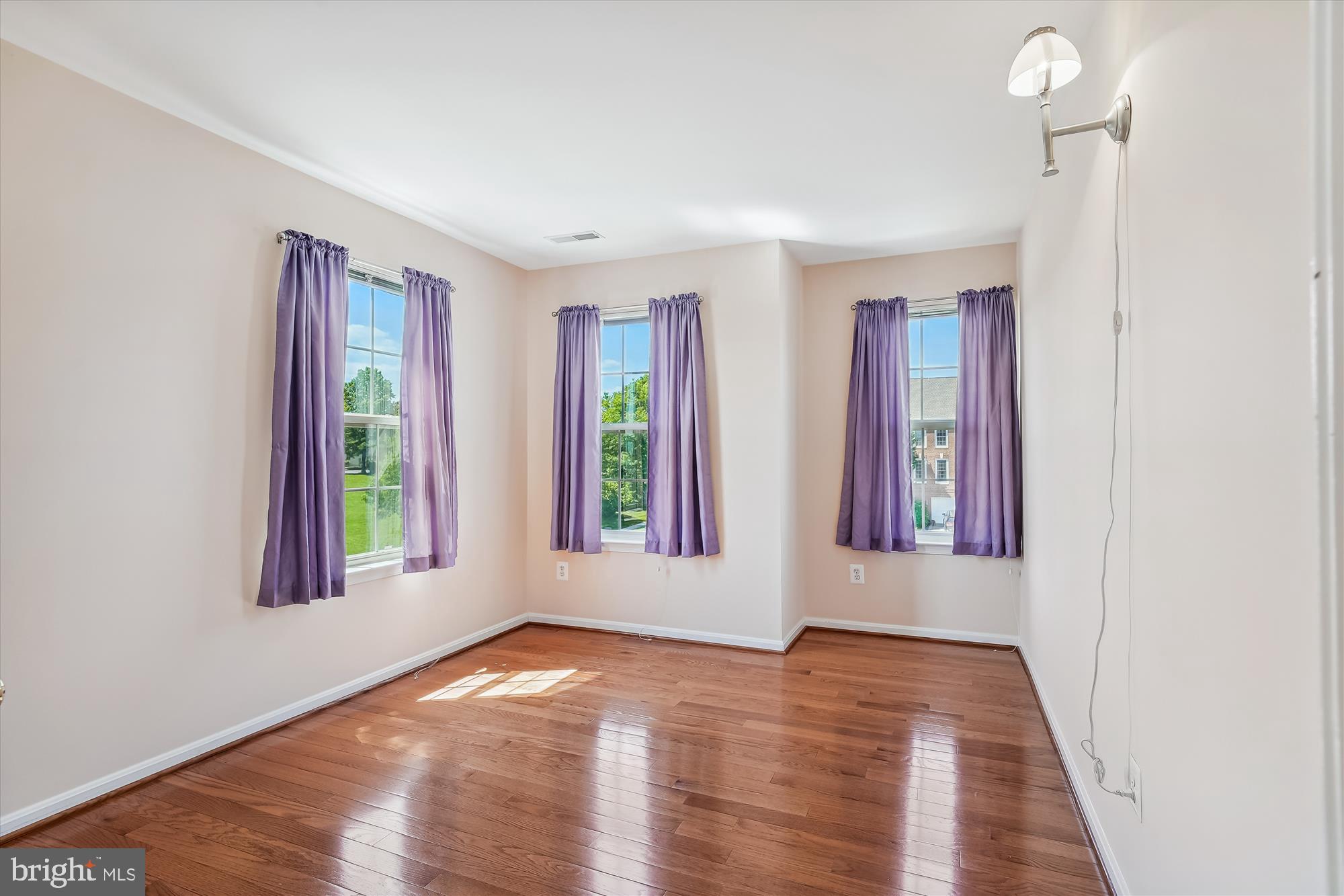 43536 Gabriel Square Chantilly, VA 20152 - Photo 18 of 53 an empty room with wooden floor and windows
