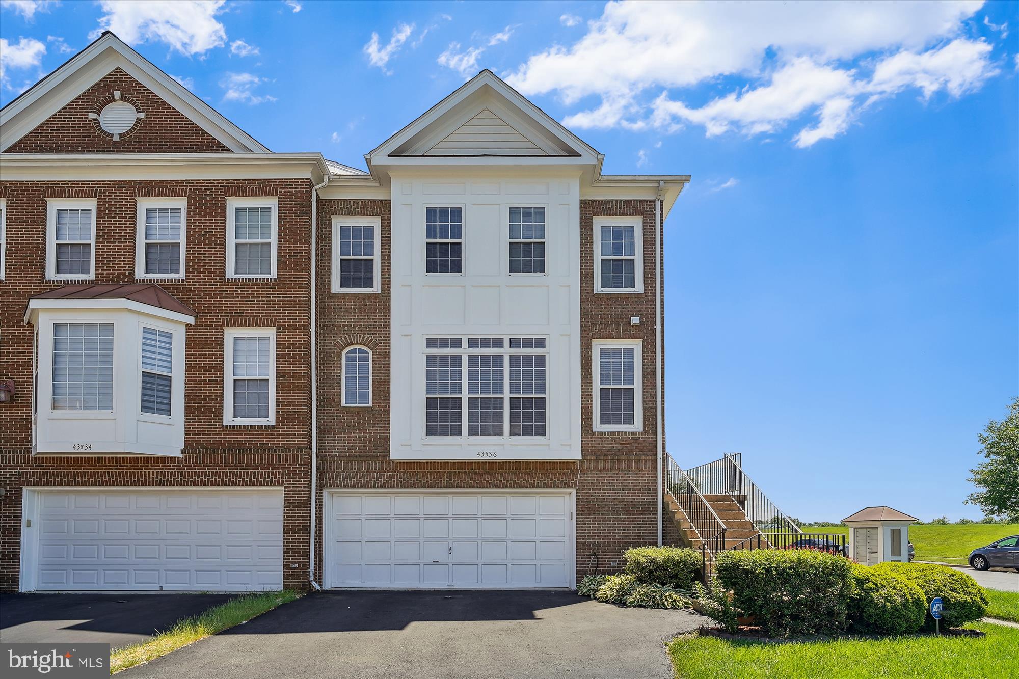 43536 Gabriel Square Chantilly, VA 20152 - Photo 31 of 53 a front view of a house with a yard