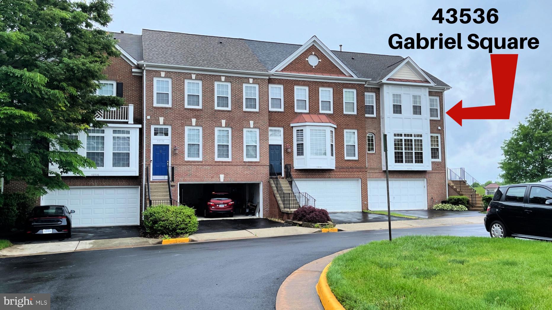 43536 Gabriel Square Chantilly, VA 20152 - Photo 32 of 53 a front view of a house with a garden and yard