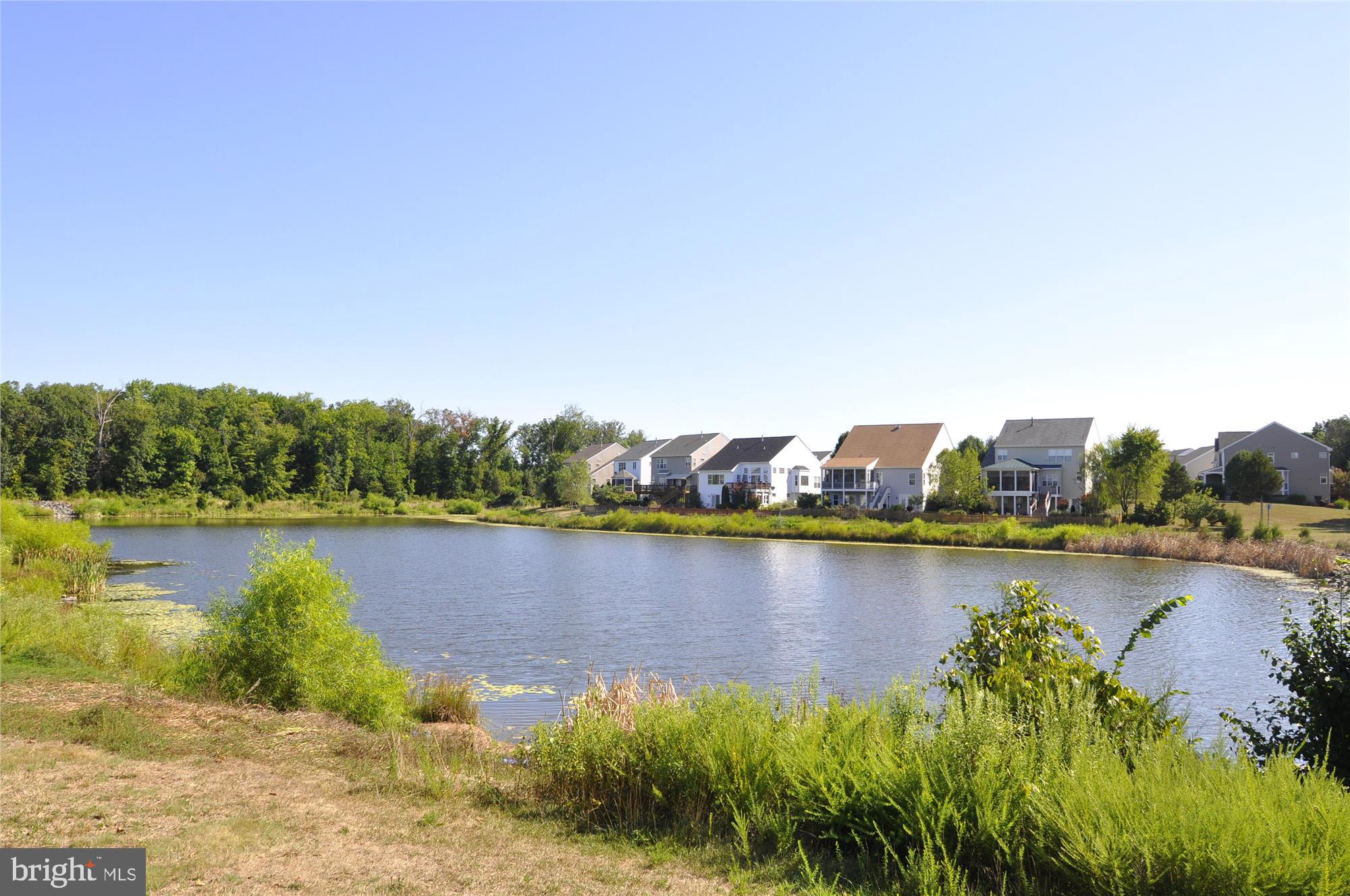 43536 Gabriel Square Chantilly, VA 20152 - Photo 39 of 53 a view of a lake with houses in the back
