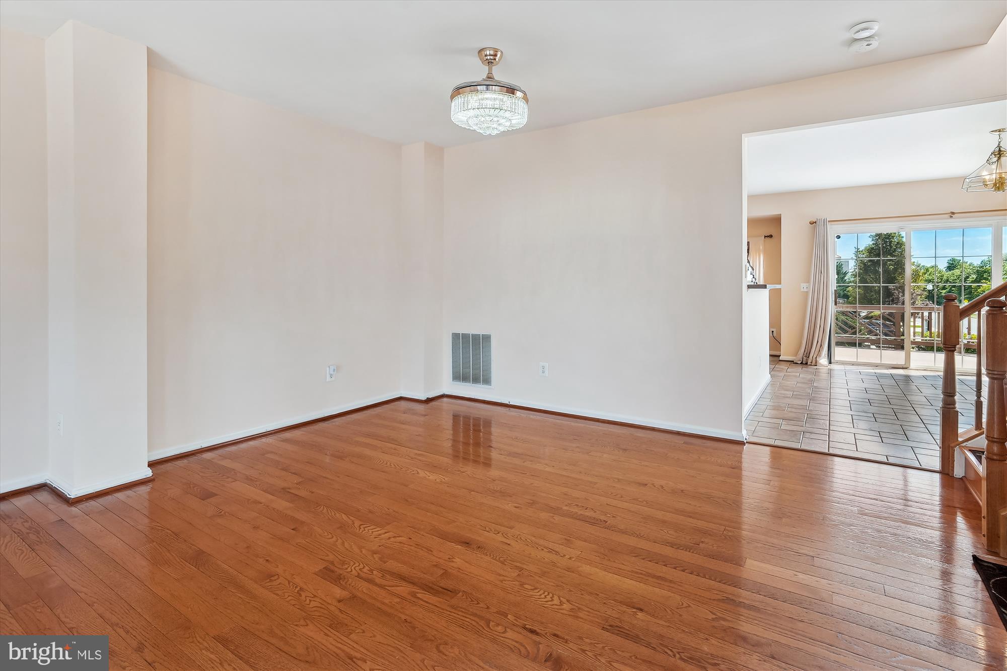43536 Gabriel Square Chantilly, VA 20152 - Photo 4 of 53 a view of empty room with wooden floor and fan