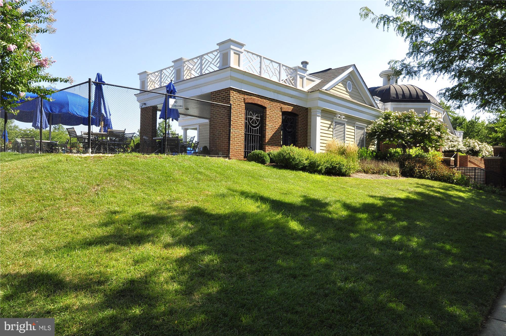 43536 Gabriel Square Chantilly, VA 20152 - Photo 48 of 53 a front view of a house with yard and green space