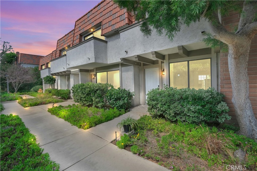 28029 Ridgebluff Court Rancho Palos Verdes, CA 90275 - Photo 1 of 1 a front view of a house with garden