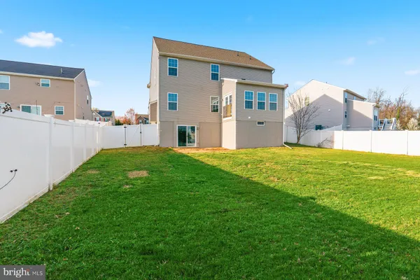 a house view with a outdoor space