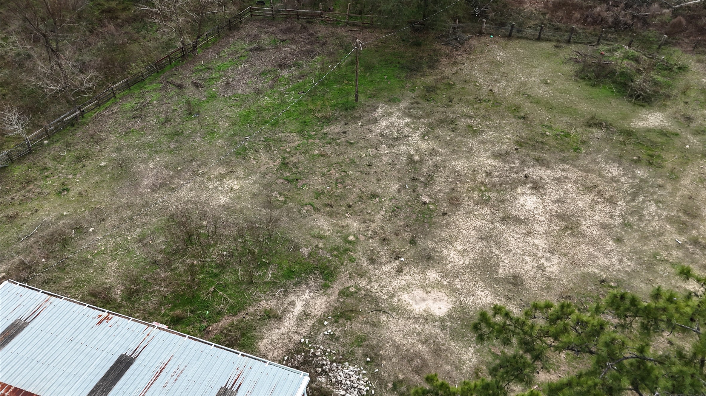 19895 Scott Gardner Road New Caney, TX 77357 - Photo 7 of 11 a view of a yard with wooden fence