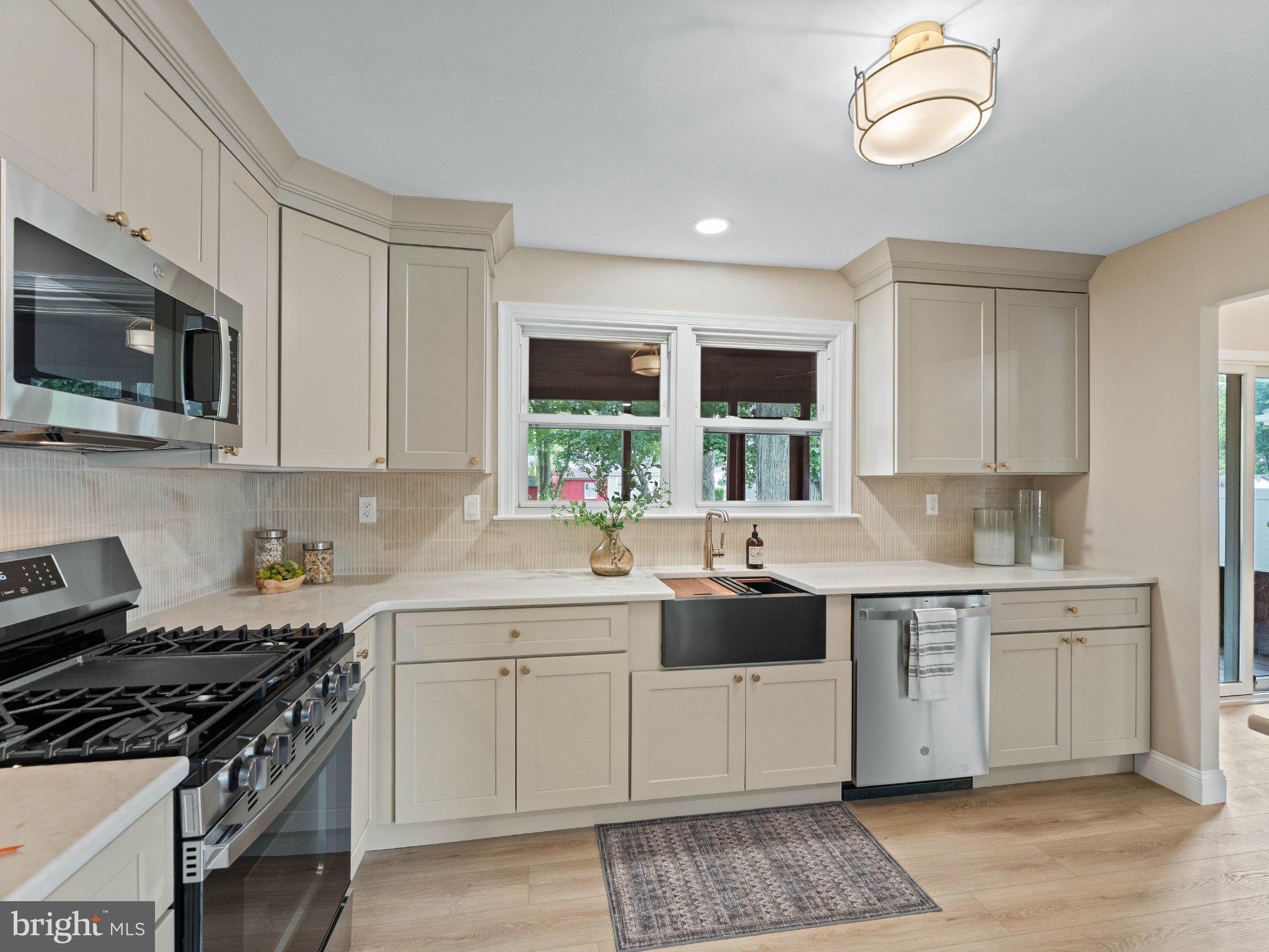 406 Yorkshire Road Cherry Hill, NJ 08034 - Photo 9 of 46 Modern kitchen with natural light.