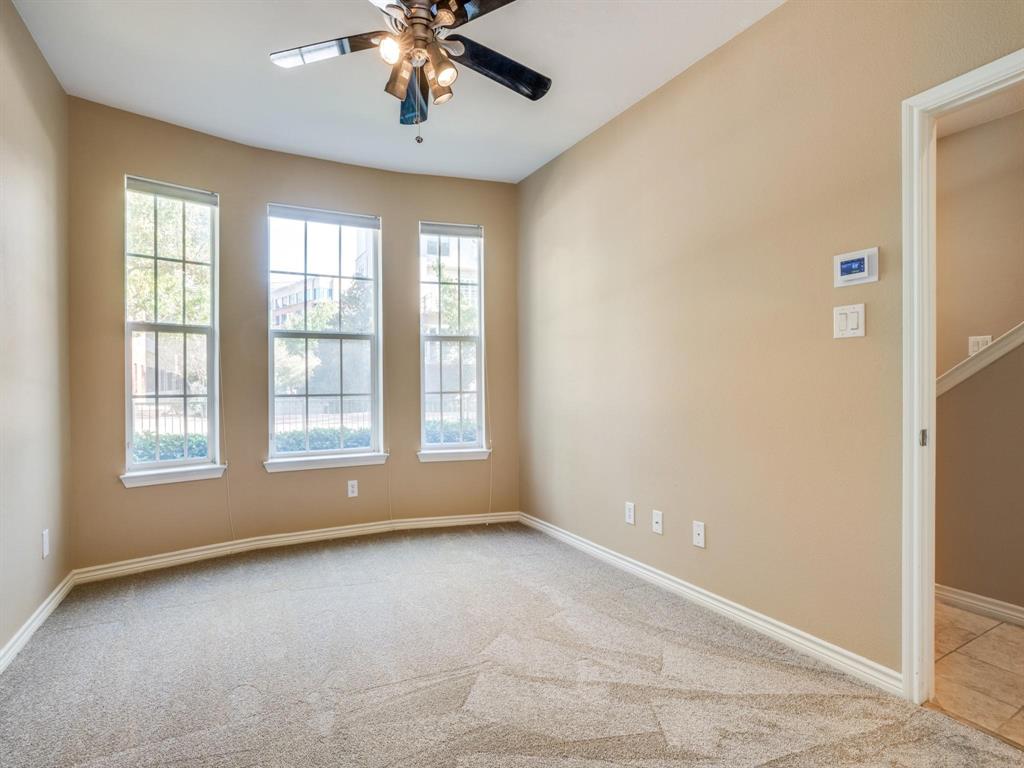 15711 Spectrum Drive, Unit 80 Addison, TX 75001 - Photo 25 of 26 a view of an empty room with a window