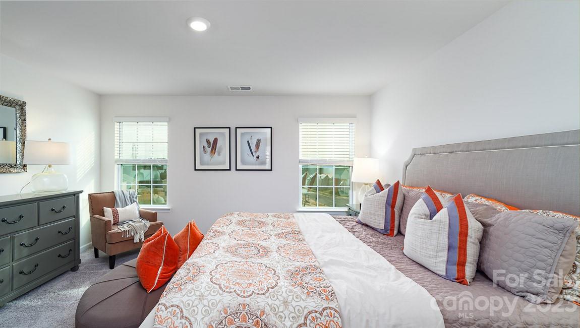 4115 Village Boulevard Northwest Conover, NC 28613 - Photo 11 of 22 a bedroom with a bed and a window