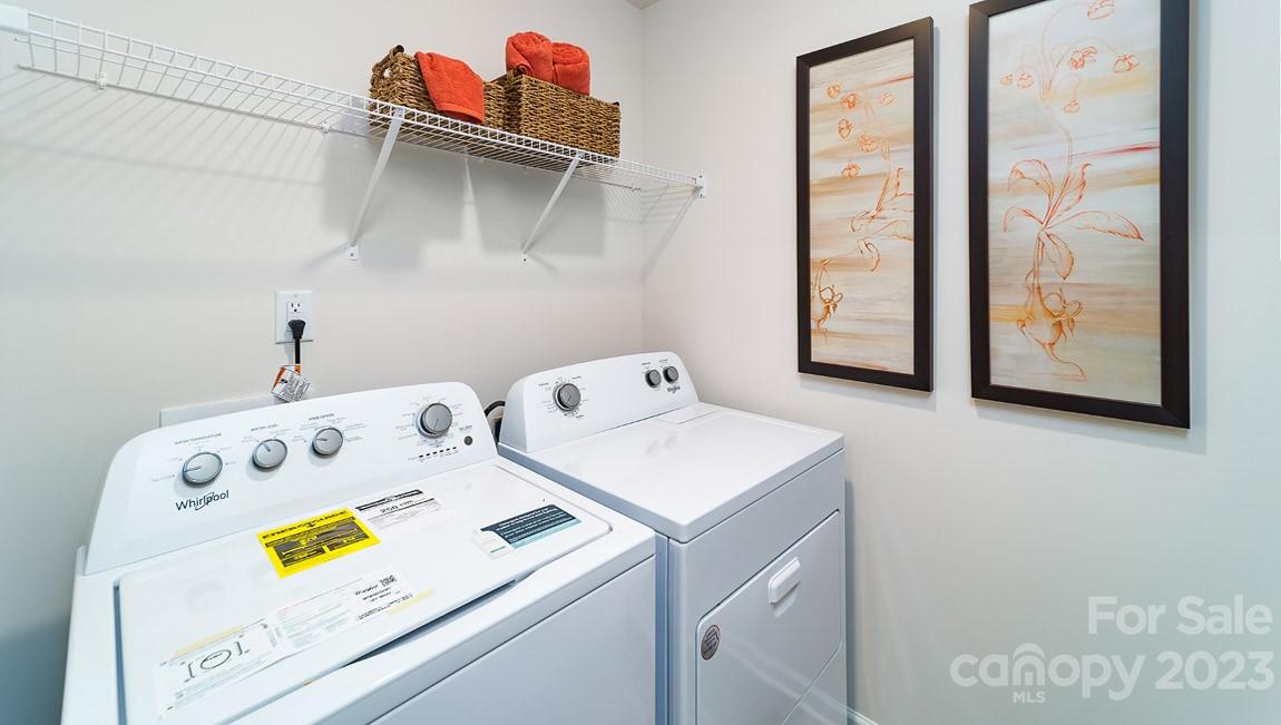 4115 Village Boulevard Northwest Conover, NC 28613 - Photo 21 of 22 a utility room with dryer and washer