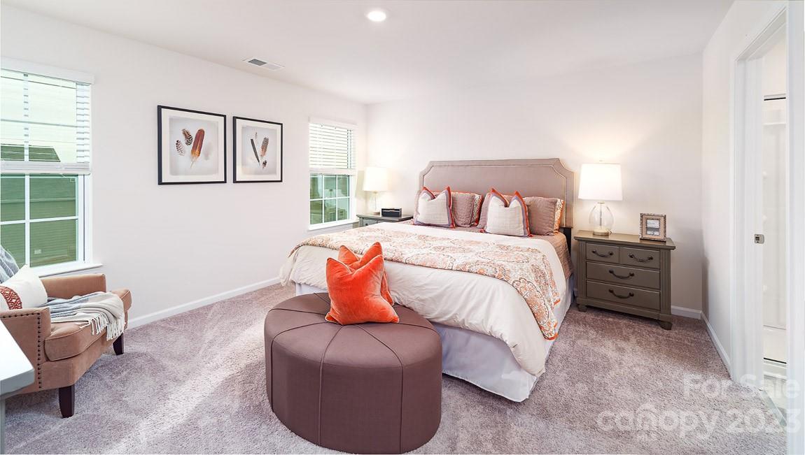 4115 Village Boulevard Northwest Conover, NC 28613 - Photo 10 of 22 a bedroom with a bed and a couch