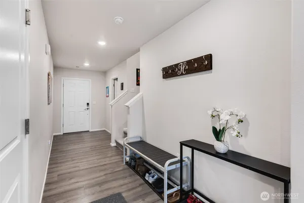 a view of entryway with wooden floor