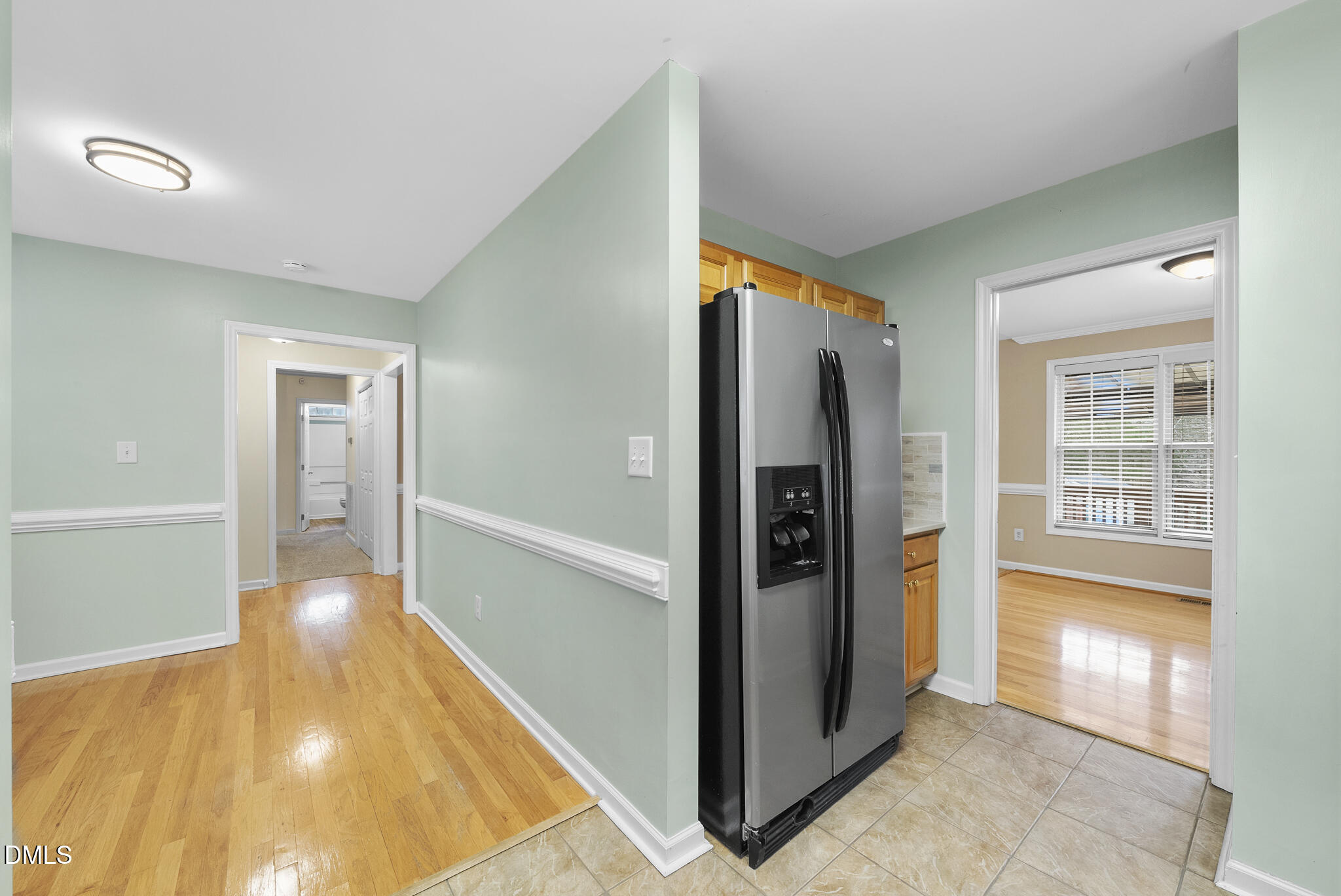 6 Stone Mill Place Durham, NC 27712 - Photo 10 of 44 a view of a hallway view with wooden floor and staircase