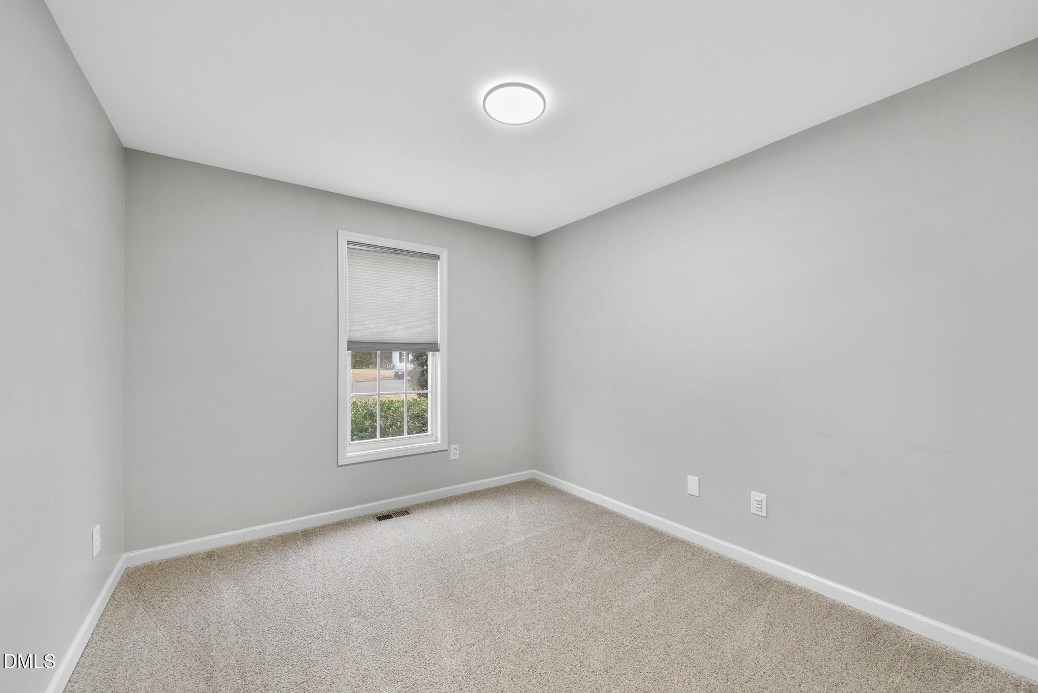 6 Stone Mill Place Durham, NC 27712 - Photo 25 of 44 a view of an empty room with a window