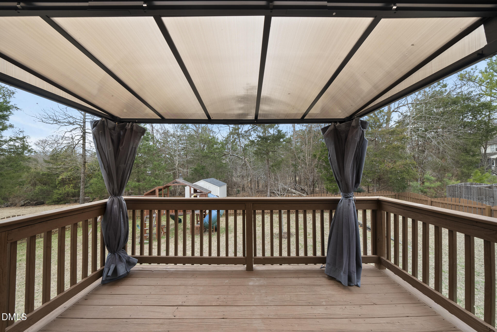 6 Stone Mill Place Durham, NC 27712 - Photo 29 of 44 a view of a wooden deck