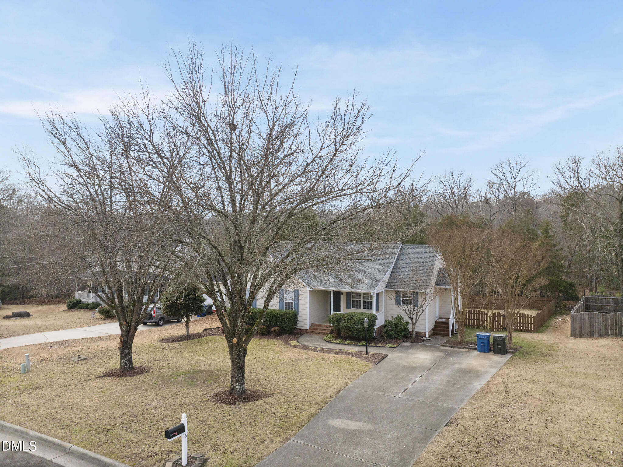6 Stone Mill Place Durham, NC 27712 - Photo 42 of 44 a front view of a house with a yard and garage