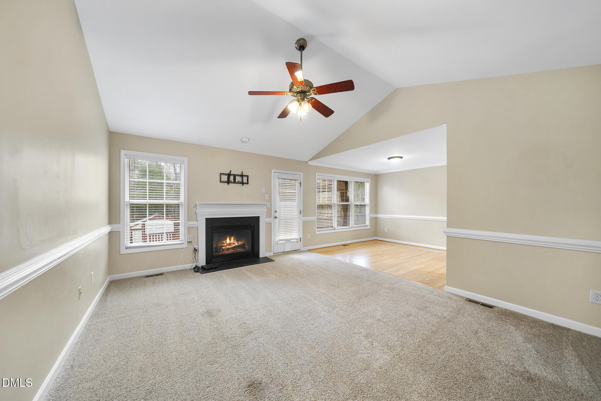 6 Stone Mill Place Durham, NC 27712 - Photo 4 of 44 a view of an empty room with window and fireplace