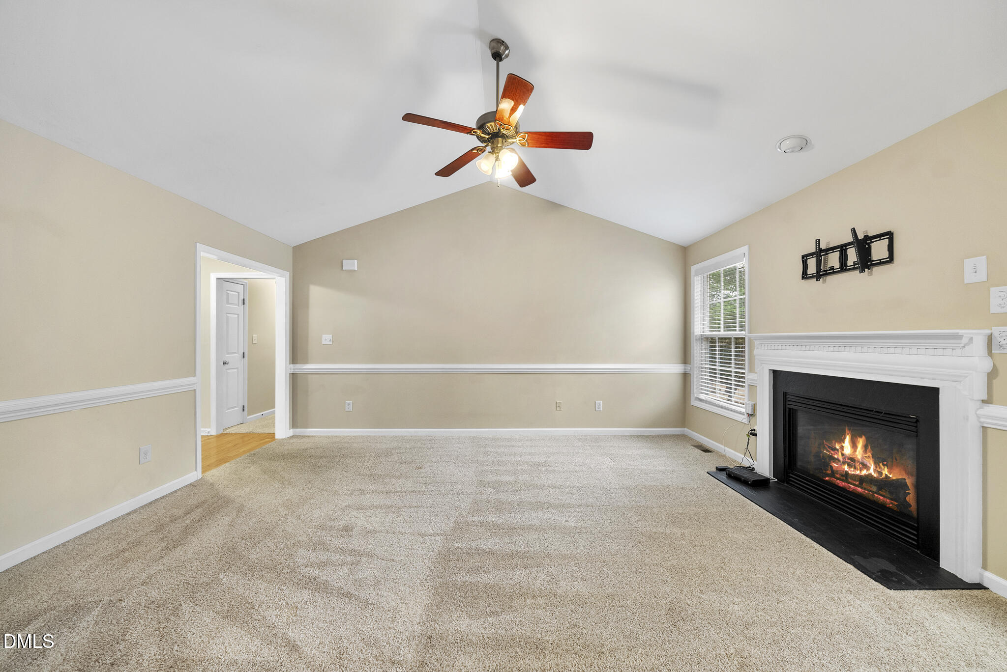 6 Stone Mill Place Durham, NC 27712 - Photo 7 of 44 a view of an empty room with window and fireplace