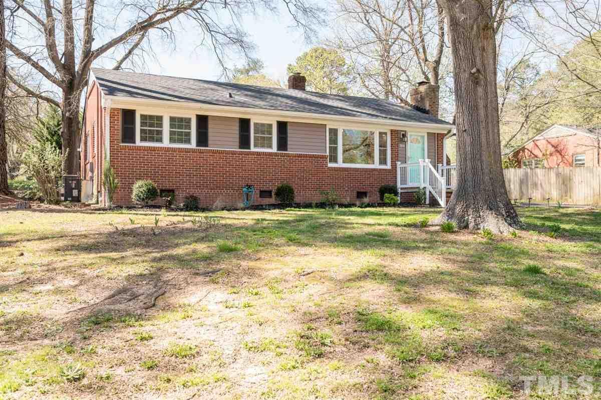 3814 Woodside Road Garner, NC 27529 - Photo 3 of 28 a view of a house with a yard