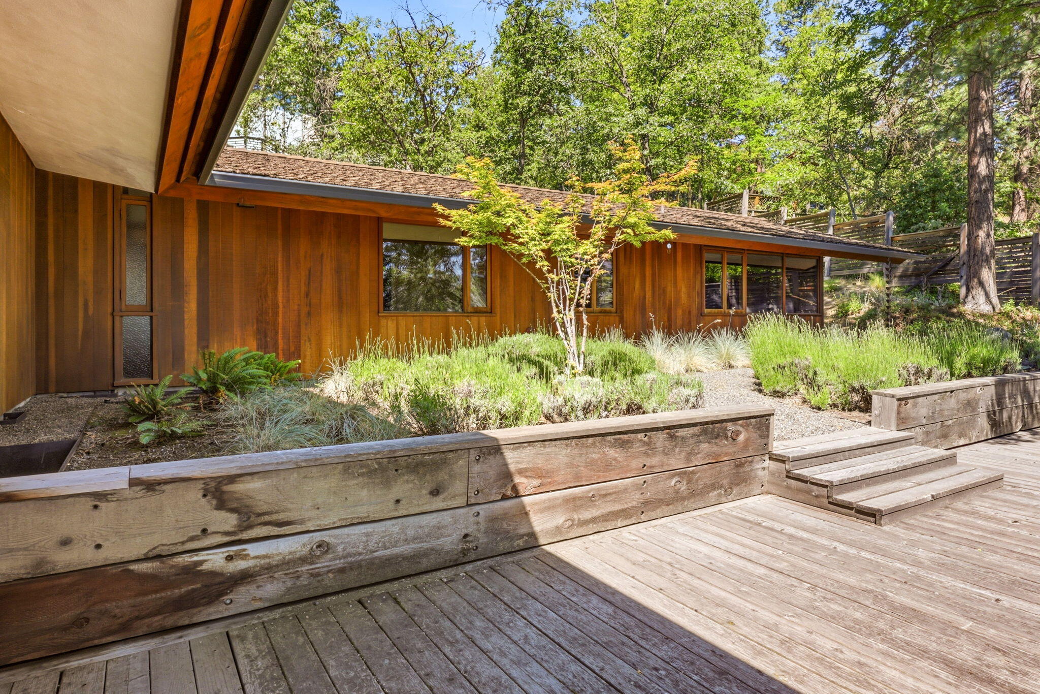 155 Terrace Street Ashland, OR 97520 - Photo 27 of 93 a front view of a house with garden