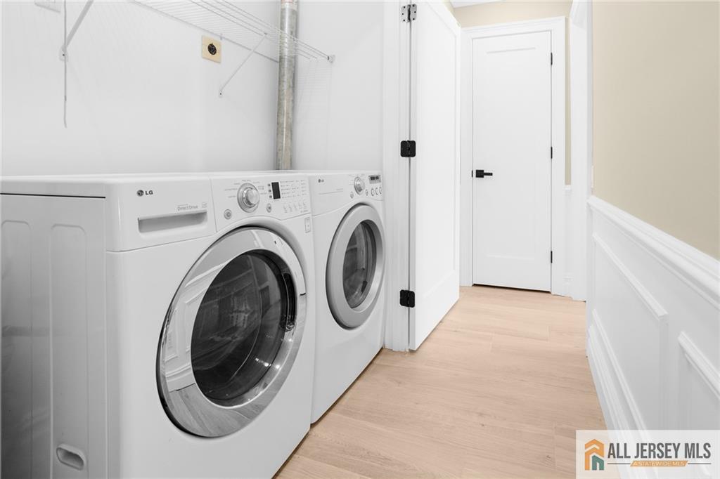 747 Marlton Road, Unit 747A Monroe Township, NJ 08831 - Photo 16 of 30 a utility room with dryer and washer