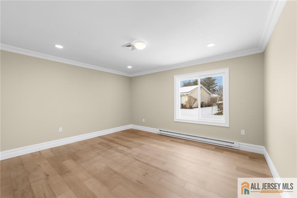 747 Marlton Road, Unit 747A Monroe Township, NJ 08831 - Photo 17 of 30 an empty room with a window