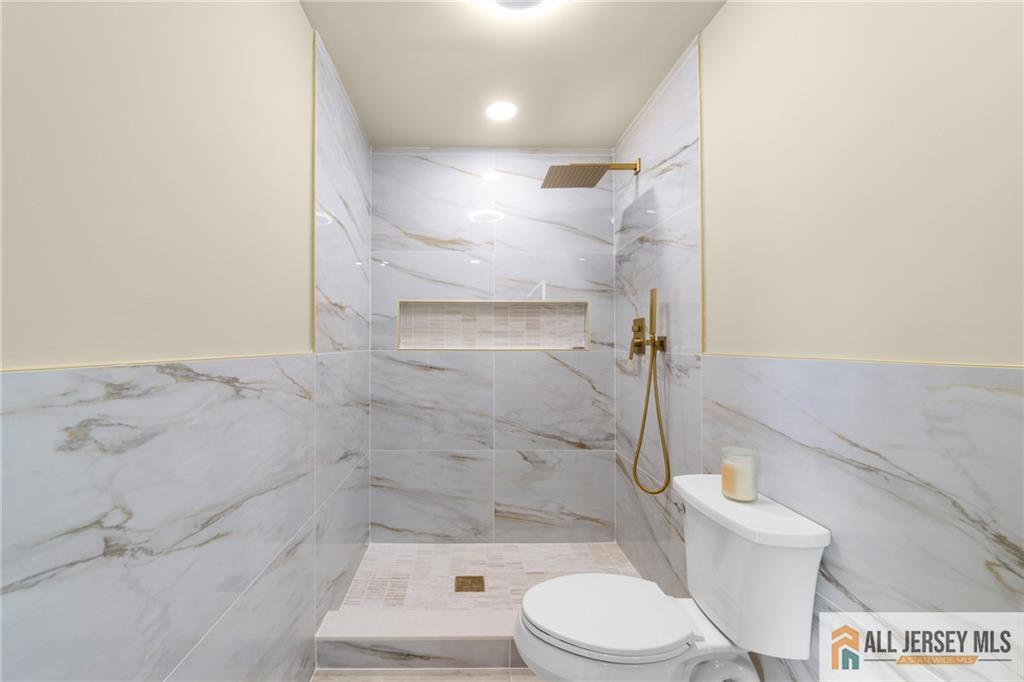 747 Marlton Road, Unit 747A Monroe Township, NJ 08831 - Photo 22 of 30 a bathroom with a toilet and shower