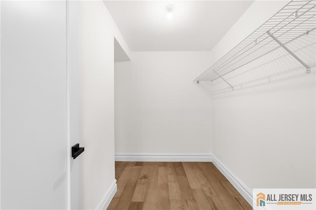 747 Marlton Road, Unit 747A Monroe Township, NJ 08831 - Photo 23 of 30 a view of a room with wooden floor