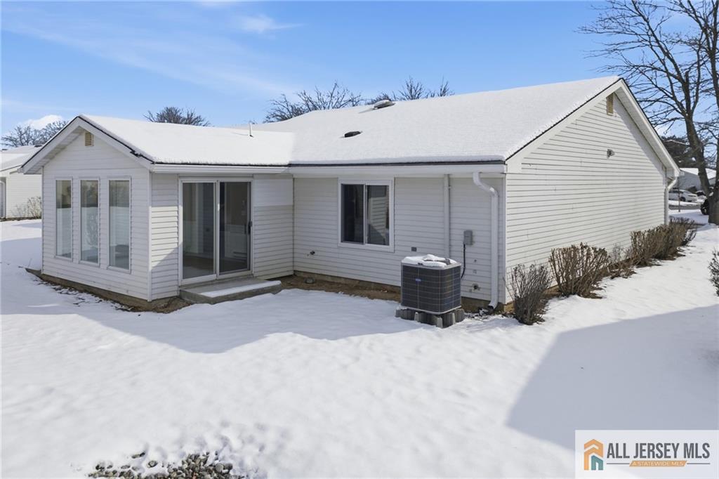 747 Marlton Road, Unit 747A Monroe Township, NJ 08831 - Photo 25 of 30 a view of a house with a yard