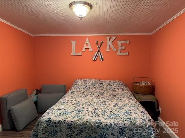 109 Hide-A-Way Trail Mount Gilead, NC 27306 - Photo 11 of 15 a bedroom with a bed and a couch