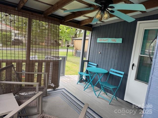 109 Hide-A-Way Trail Mount Gilead, NC 27306 - Photo 15 of 15 a patio with table and chairs
