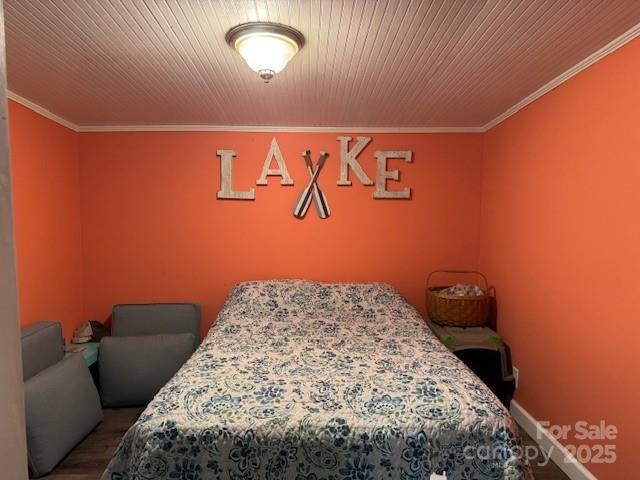 109 Hide-A-Way Trail Mount Gilead, NC 27306 - Photo 10 of 15 a bedroom with a bed and a couch