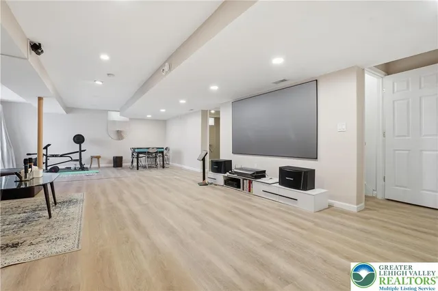 a view of a living room a dining room with furniture