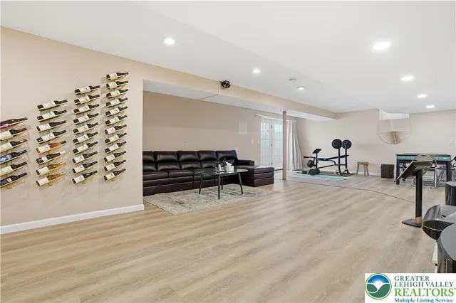 a room with furniture and wooden floor