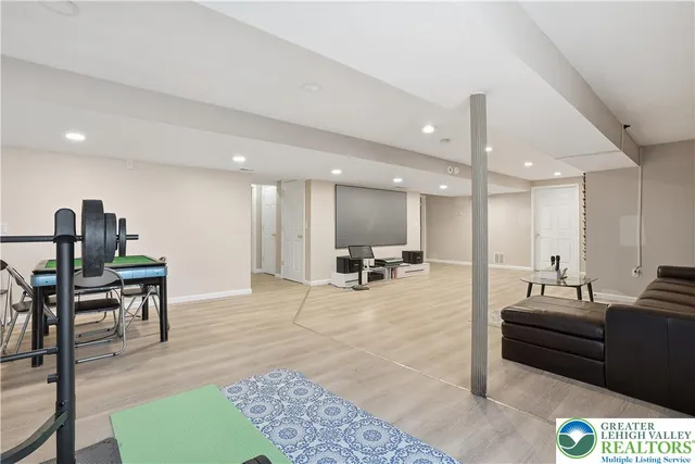 a living room with furniture and a table