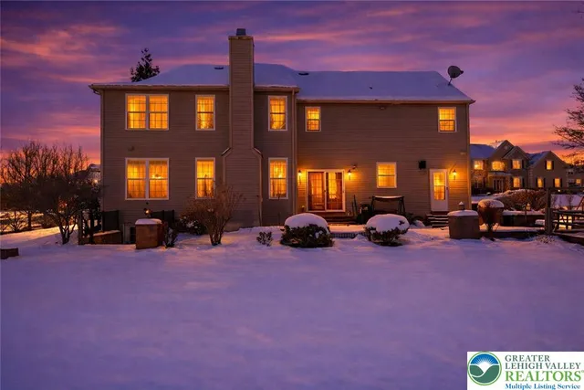 a view of a brick building with many windows in front of it