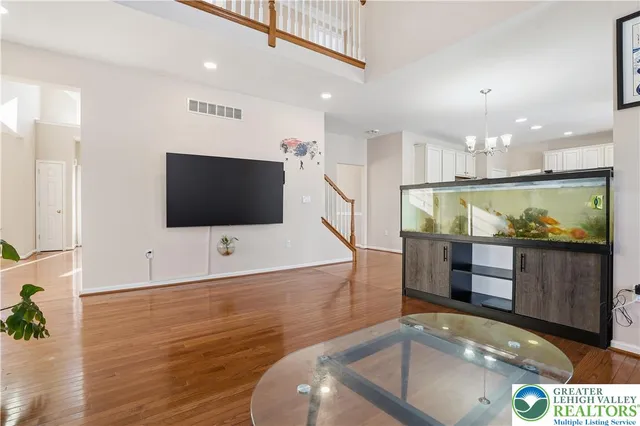 a living room with flat screen tv