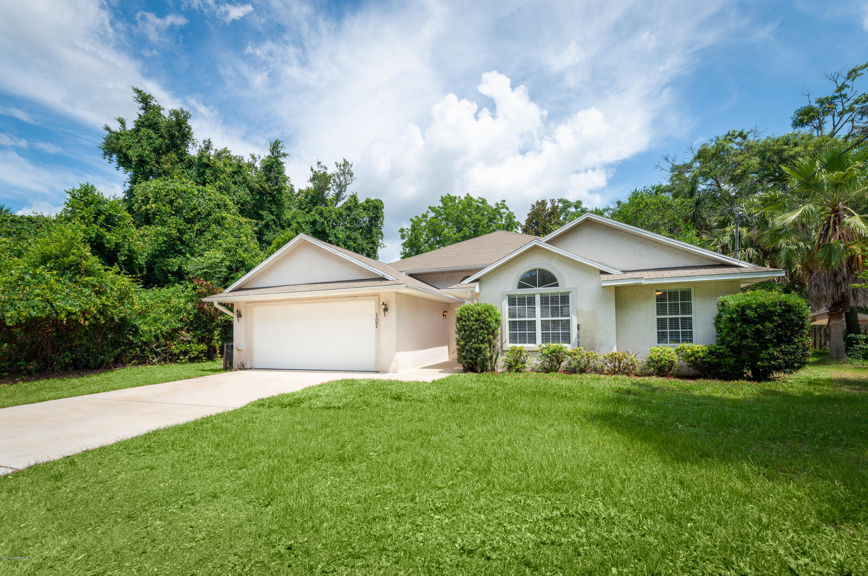 107 Mohegan Road St. Augustine, FL 32086 - Photo 1 of 38 a front view of house with yard and green space
