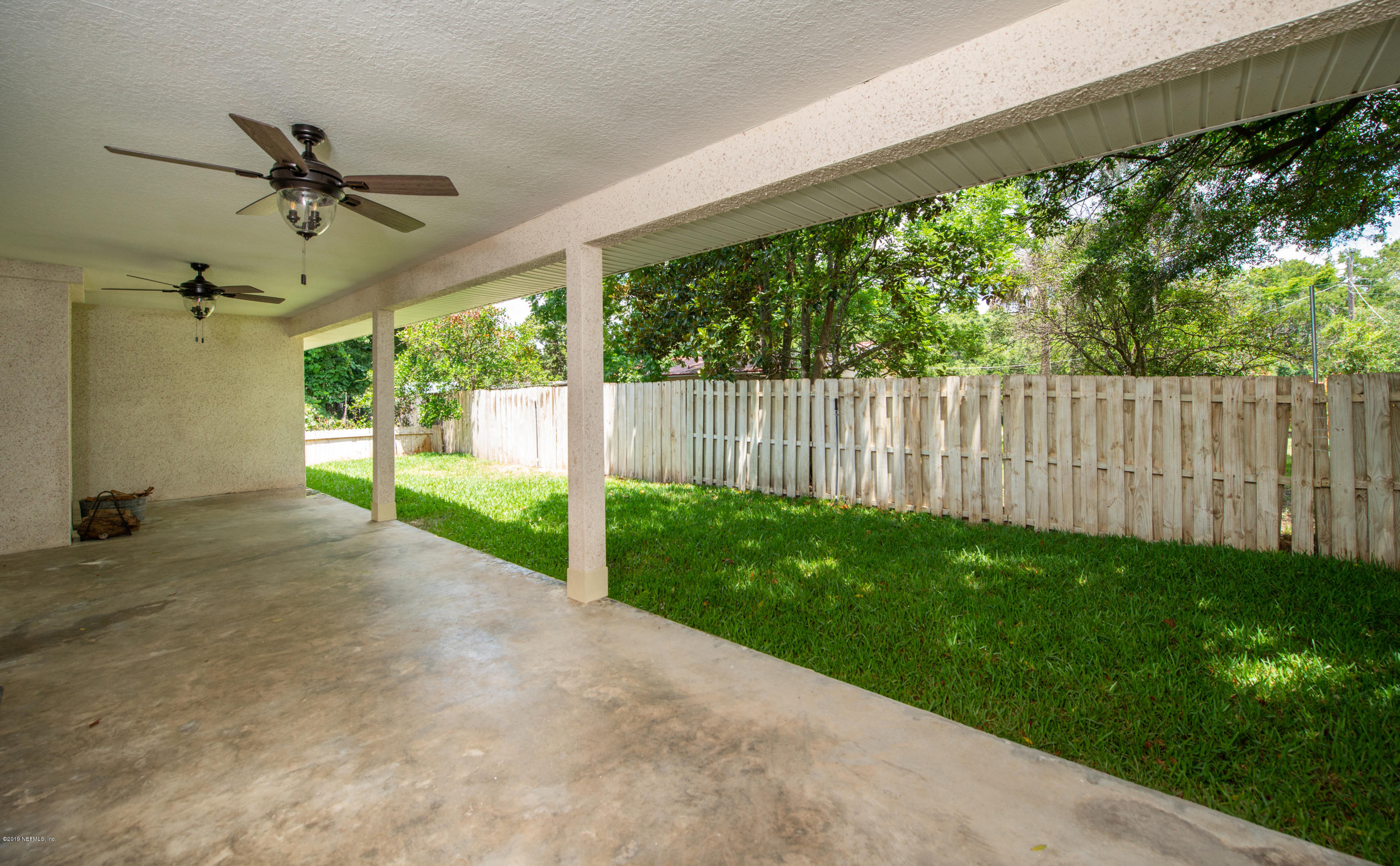 107 Mohegan Road St. Augustine, FL 32086 - Photo 29 of 38 a view of a porch with a backyard