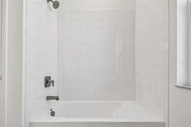 a bathroom with a bathtub