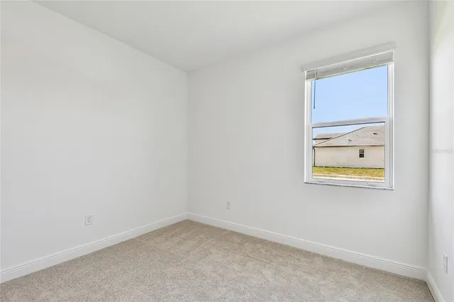 an empty room with a window