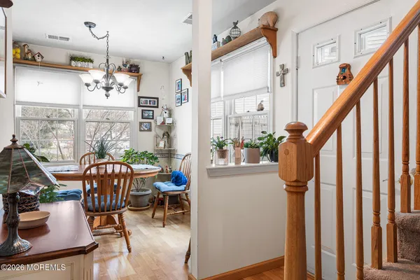 a view of a dining room with furniture window and outside view