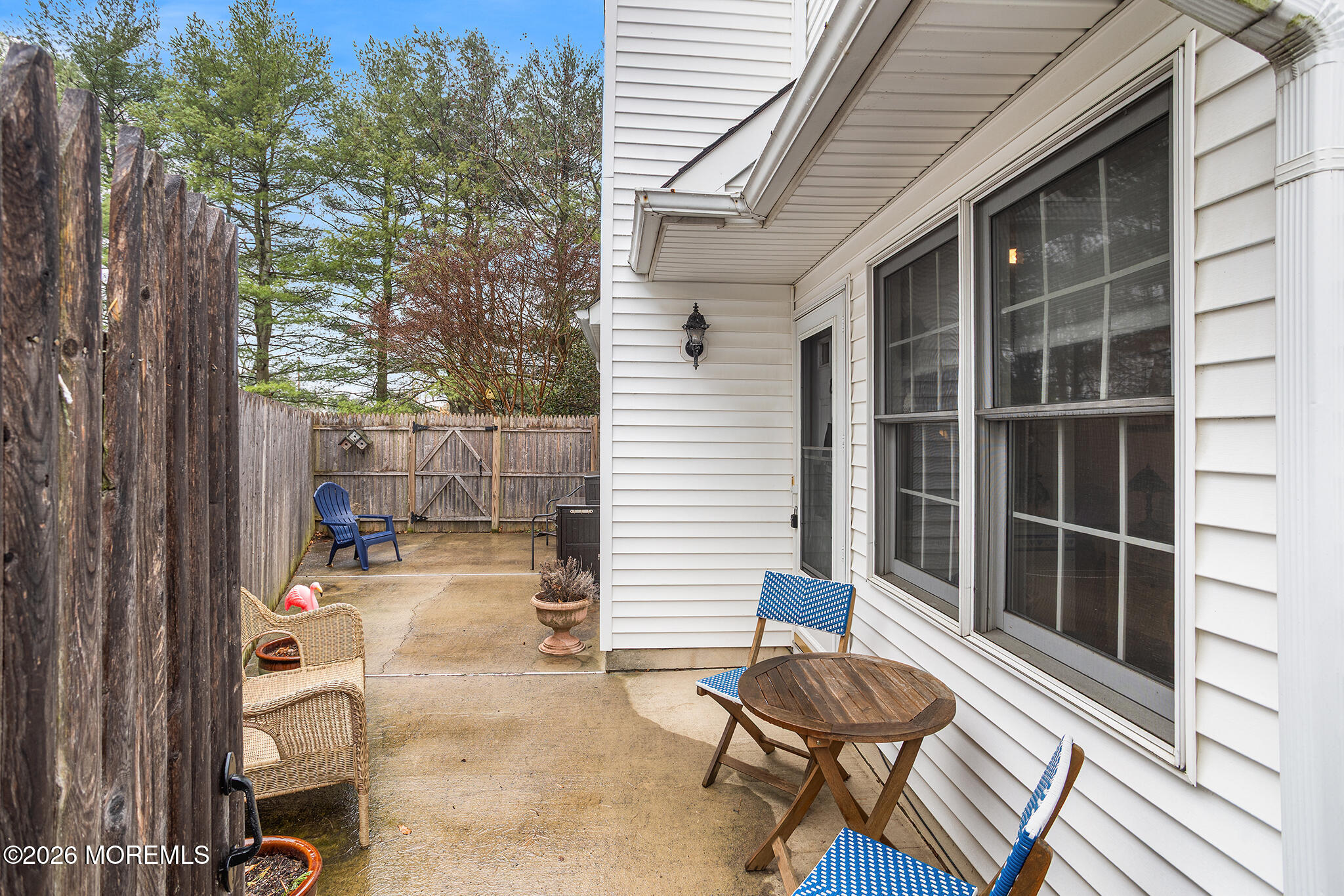 11 Browning Court Freehold, NJ 07728 - Photo 28 of 34 a view of a porch with a chairs and table in a patio