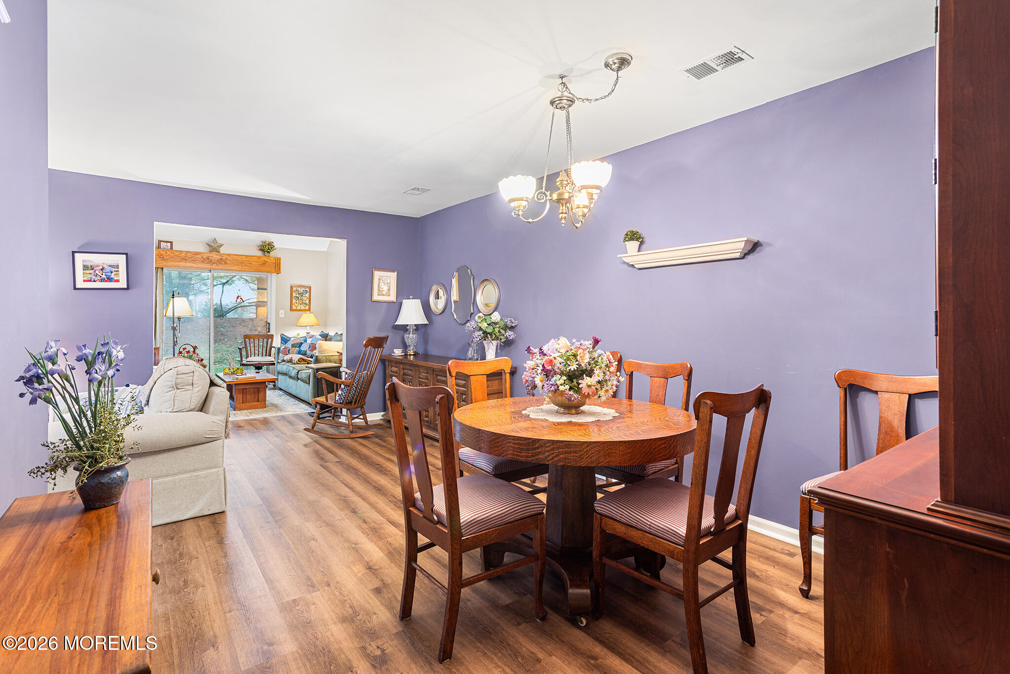11 Browning Court Freehold, NJ 07728 - Photo 5 of 34 a view of a dining room with furniture window and wooden floor