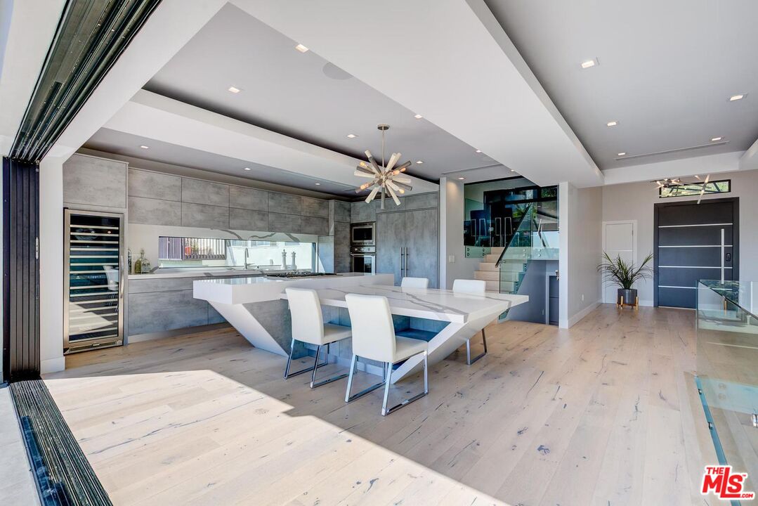 8401 Wyndham Road Los Angeles, CA 90046 - Photo 24 of 34 a view of a living room and dining room